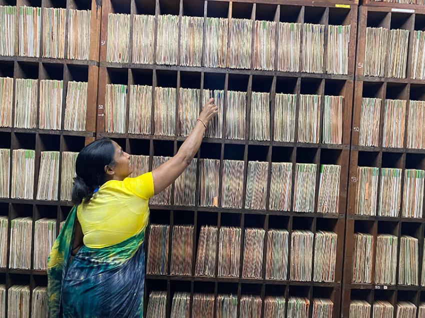 Subhashini De Silva,  Record Librarian, showing old records at the Hindi Language library of the station