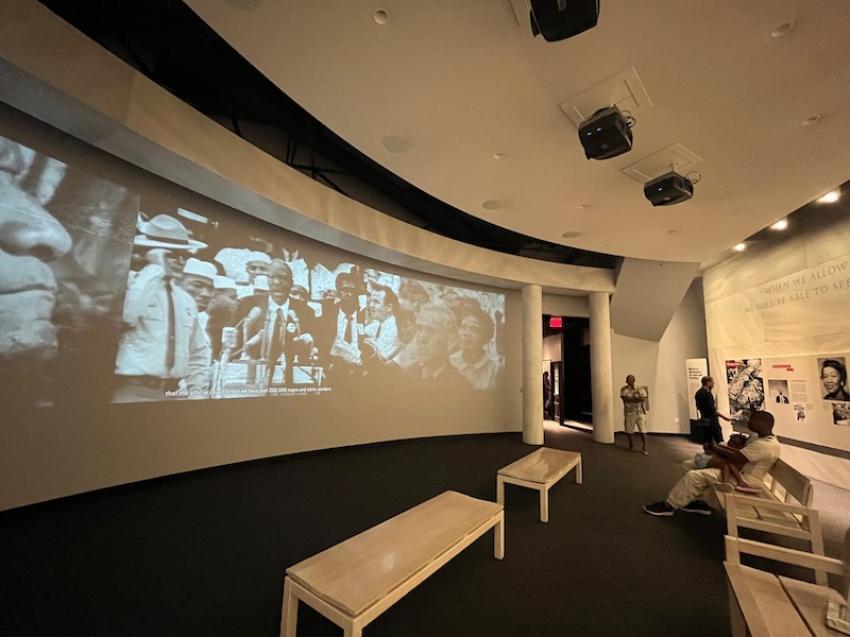 Watch the old historic footage of the American civil rights movement at the centre. 