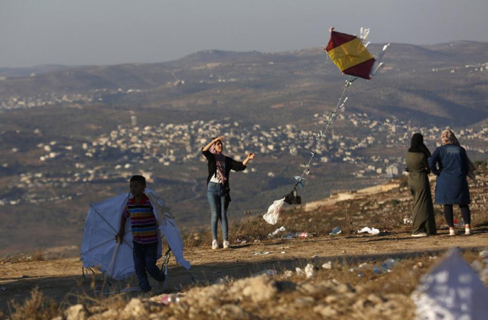 Images of the Day:People flying kites on Eid in We ...