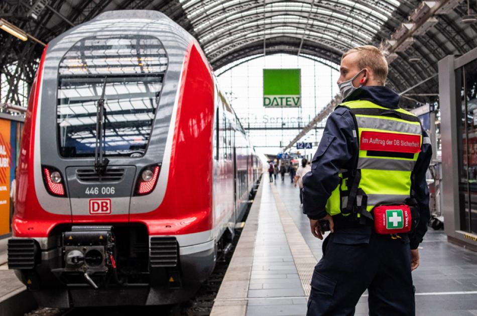 Images of the Day:A security member wearing a face mask in Frankfurt