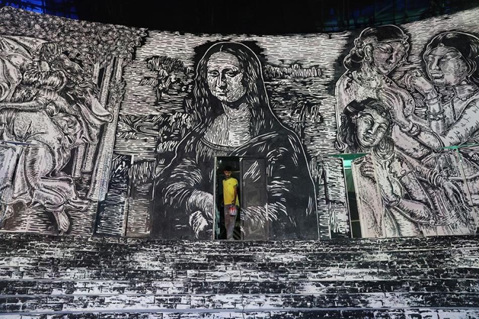 Kolkata artisan crafts Durga Puja pandal highlighting acid attack survivors’ rights