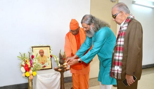 Sraddhalu Ranade , Swami Suparnananda Maharaj and Dr. Subir Chowdhury light the ceremonial lamp in memory of Prof. SK Chakraborty. Photo: PR Team