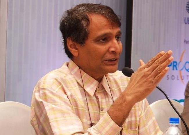 Suresh Prabhu flags off a new first passenger train in south Assam